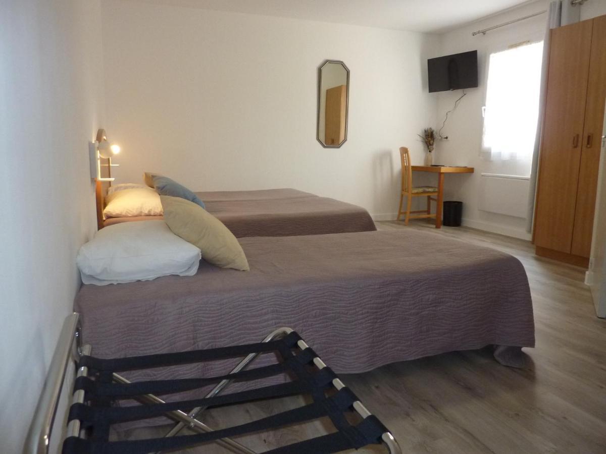 Hôtel A La Renommée Saint-Père Esterno foto