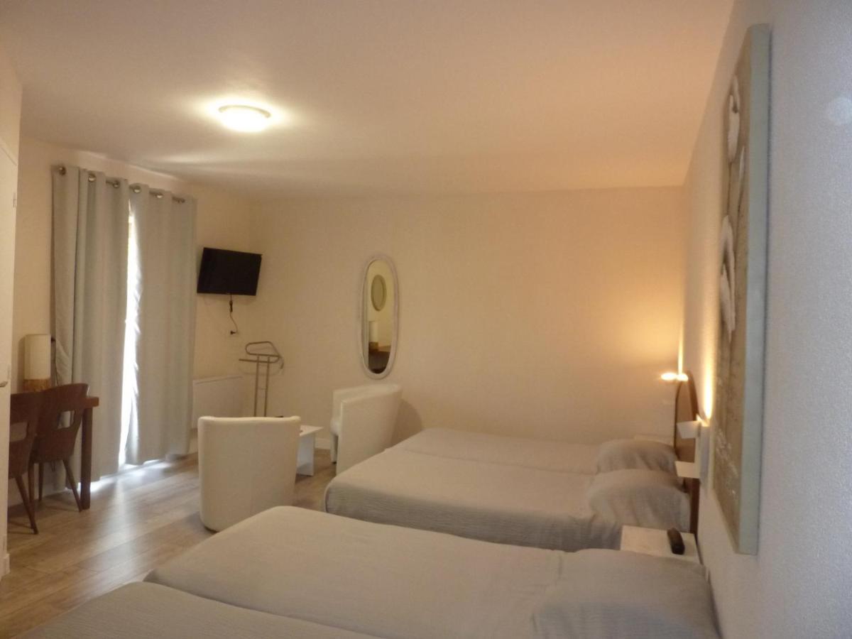 Hôtel A La Renommée Saint-Père Esterno foto